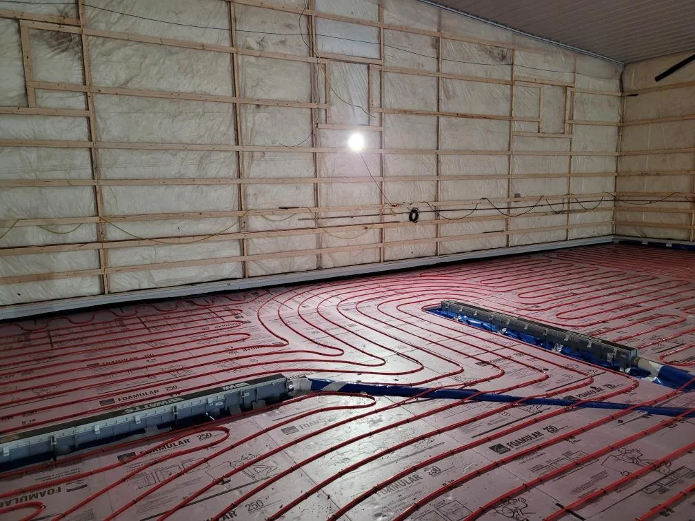 Radiant floor heating tubing installed before a concrete pour